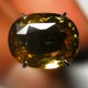 Batu mulia zircon alami 2.67 carat, bentuk oval warna kuning oranye