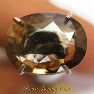 Batu Mulia Alami Orangy Brown Oval Zircon 2.75 carat