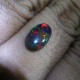 Black Opal Motif Harlequin 0.95 carat gambaran ukuran di jari