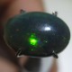 Batu Mulia Black Opal Hijau Oranye 1.85 carat