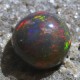 Batu Mulia Asli berkualitas Black Opal Jarong Lurik Bundar 2.10 carat
